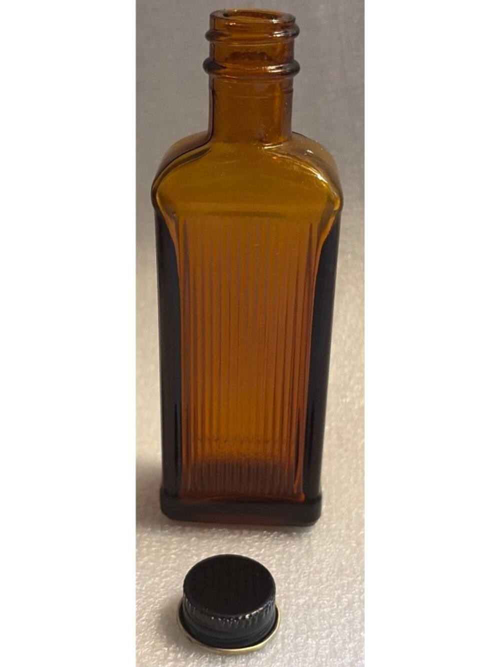 VTG Amber Glass Medicine Bottle Ribbed Design Black Metal Cap 1939 Apothecary